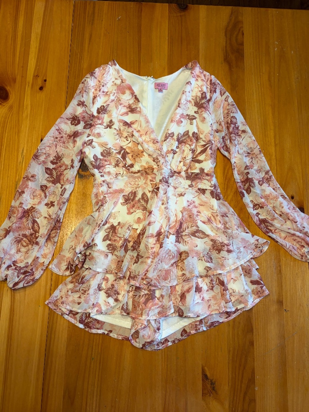 Francesca’s Floral Long Sleeve Ruffle Romper